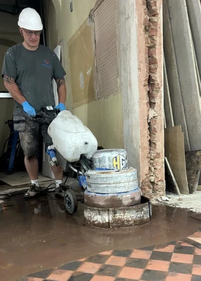 Specialist grinding equipment restoring the historic quarry tile floor at Ipswich Museum