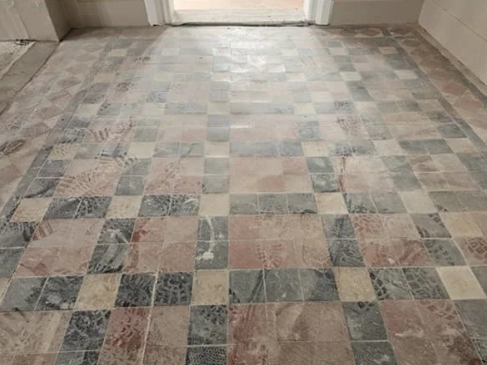 Historic quarry tile floor before restoration