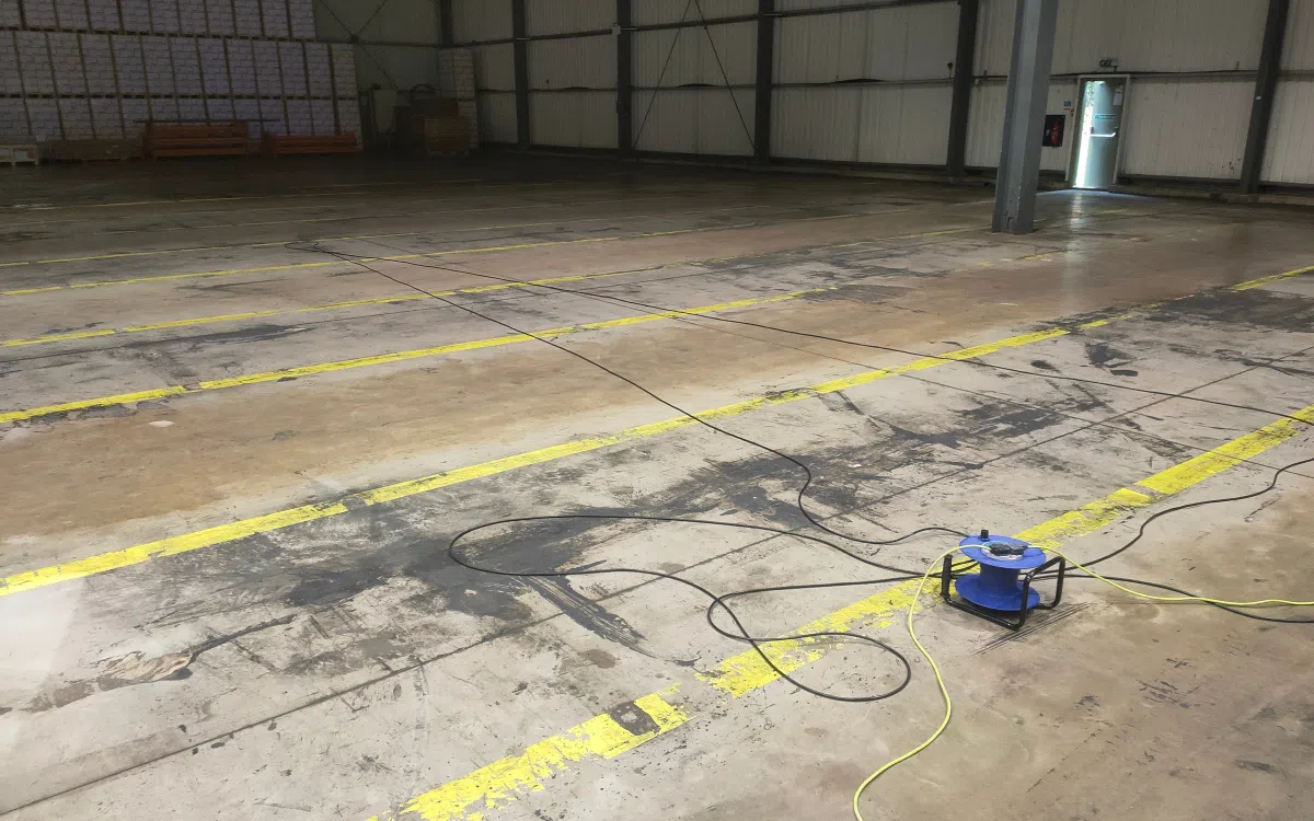 Concrete floor before professional cleaning
