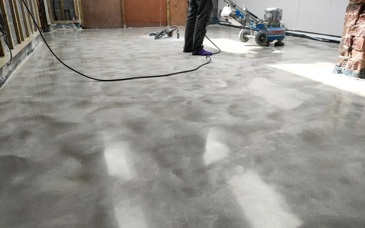 Traditional concrete floor installation in progress