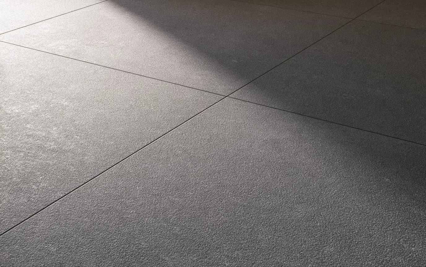 Textured non-slip tile floor requiring detailed cleaning