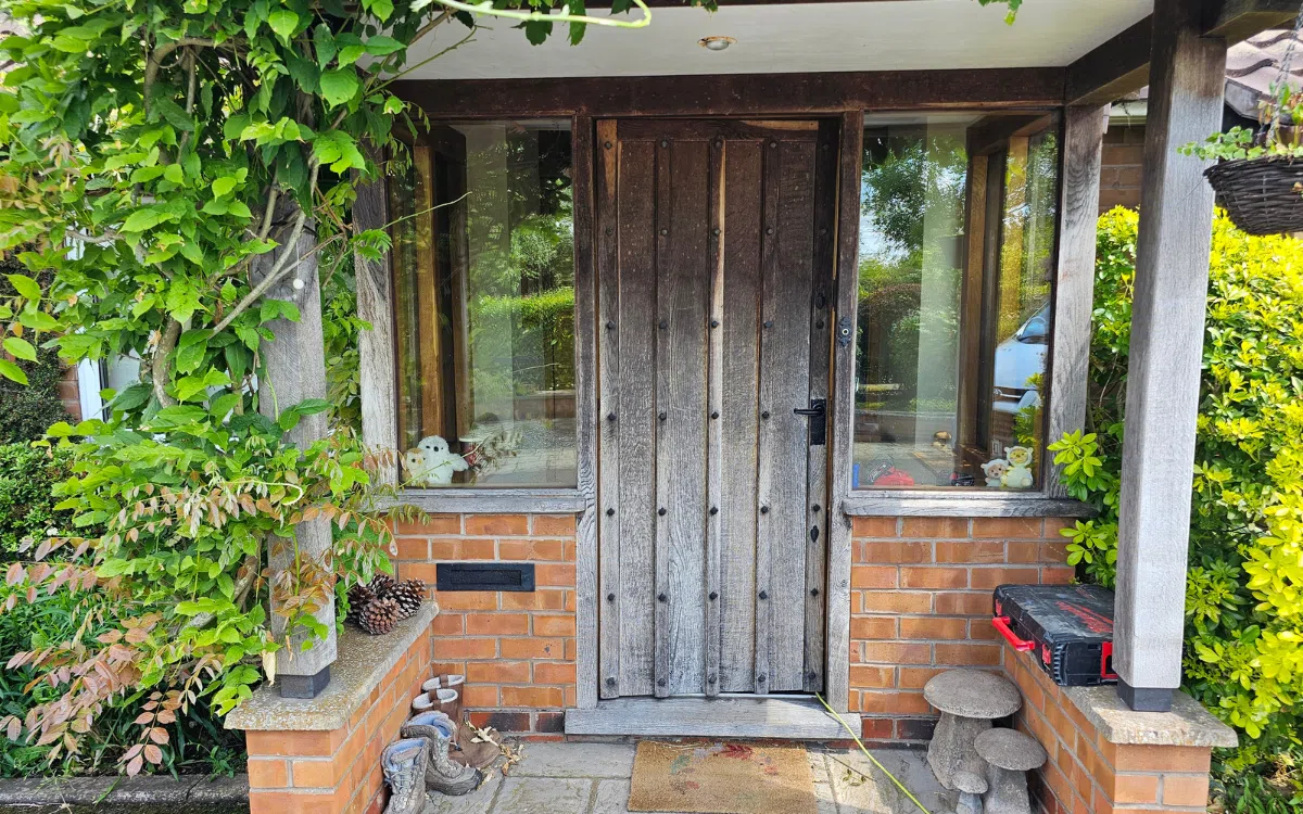 Weather-damaged timber before professional restoration